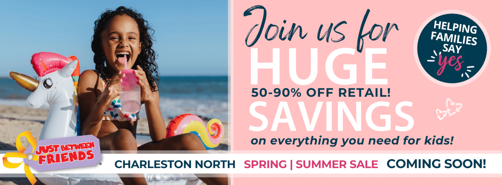 Little girl wearing a Santa Hat and writing her Holiday Wish List